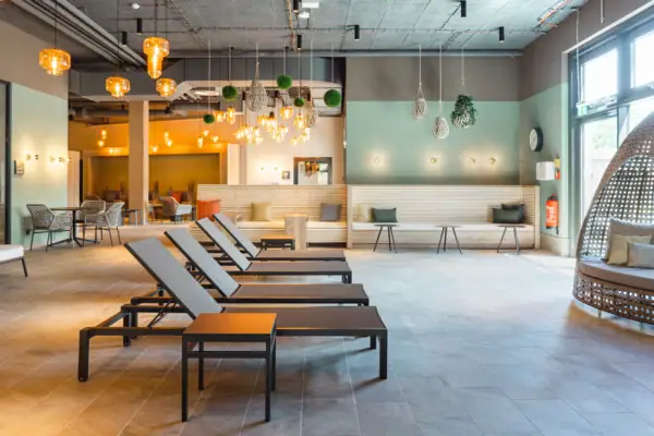 Loungers A room with chairs and a bench.