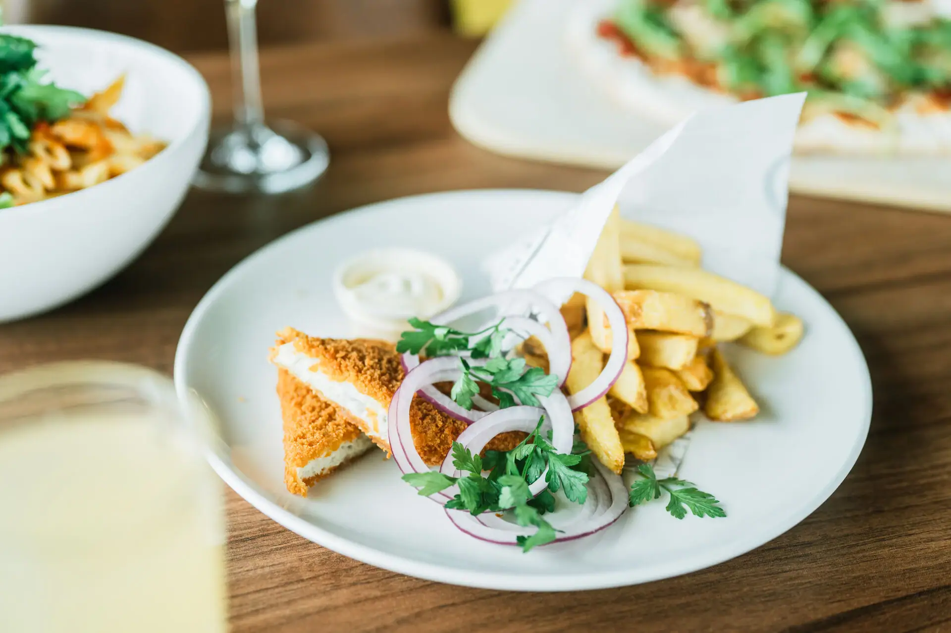 Fish from the field A plate of fast food on a table.