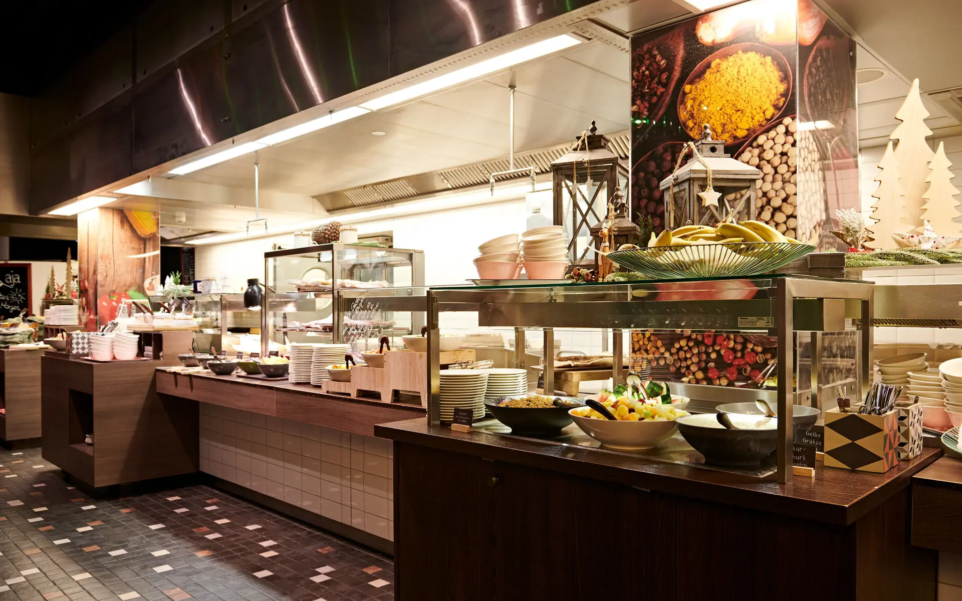 A buffet area with many different dishes in pleasant light. 