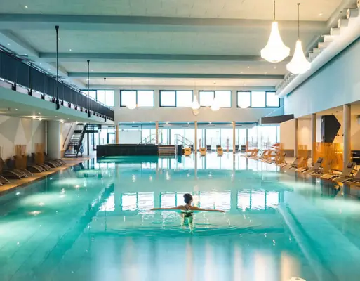 A woman in a swimming pool.
