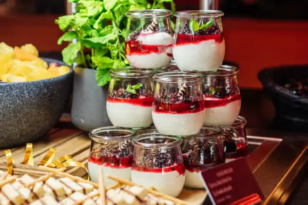 New Year's Eve buffet at the aja Bad Saarow A selection of desserts in glasses on a table.