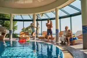A group of people by the pool.