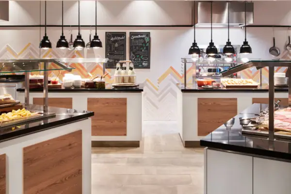 A buffet with various dishes in a restaurant.