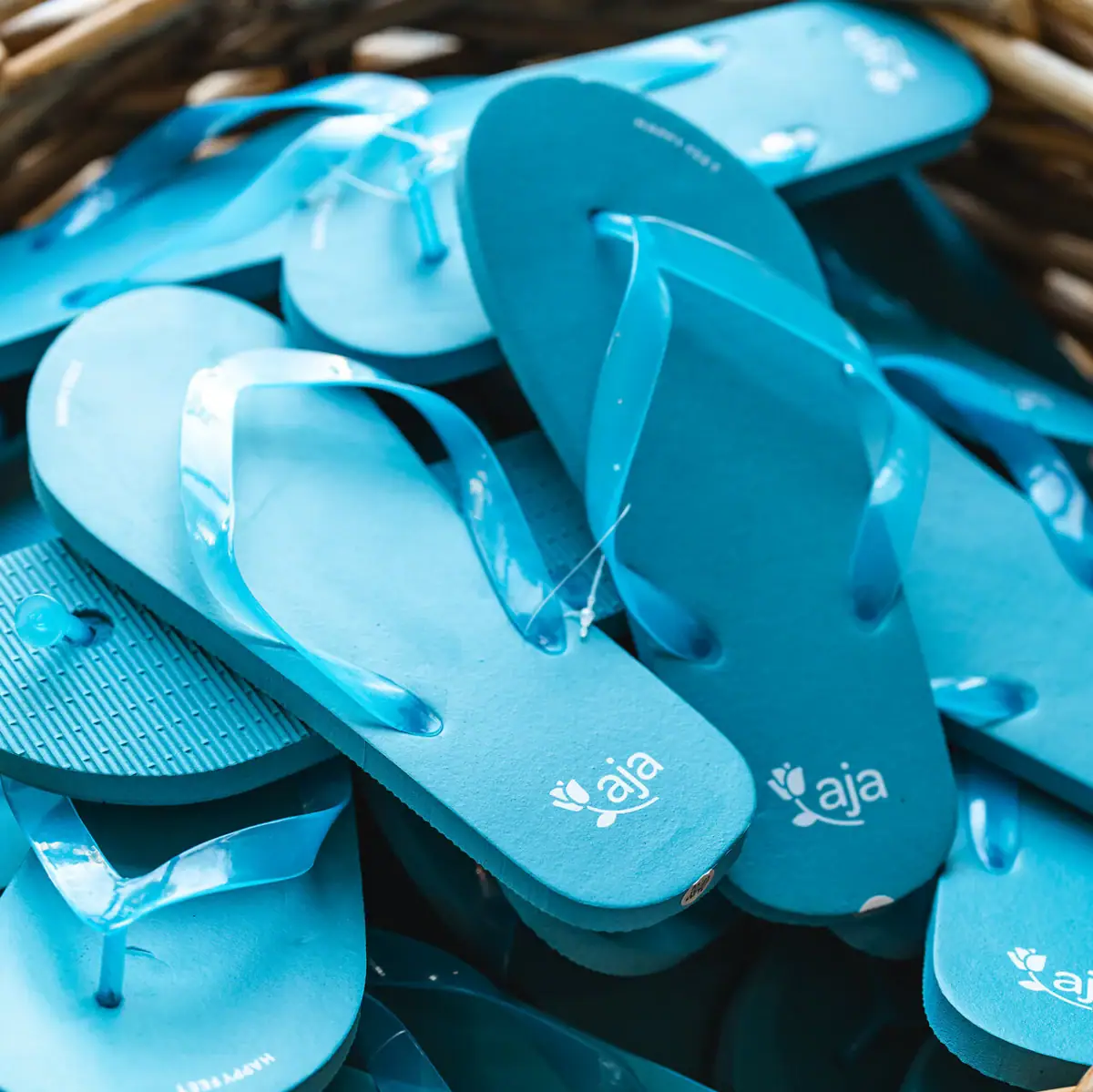 A basket of blue flip-flops.