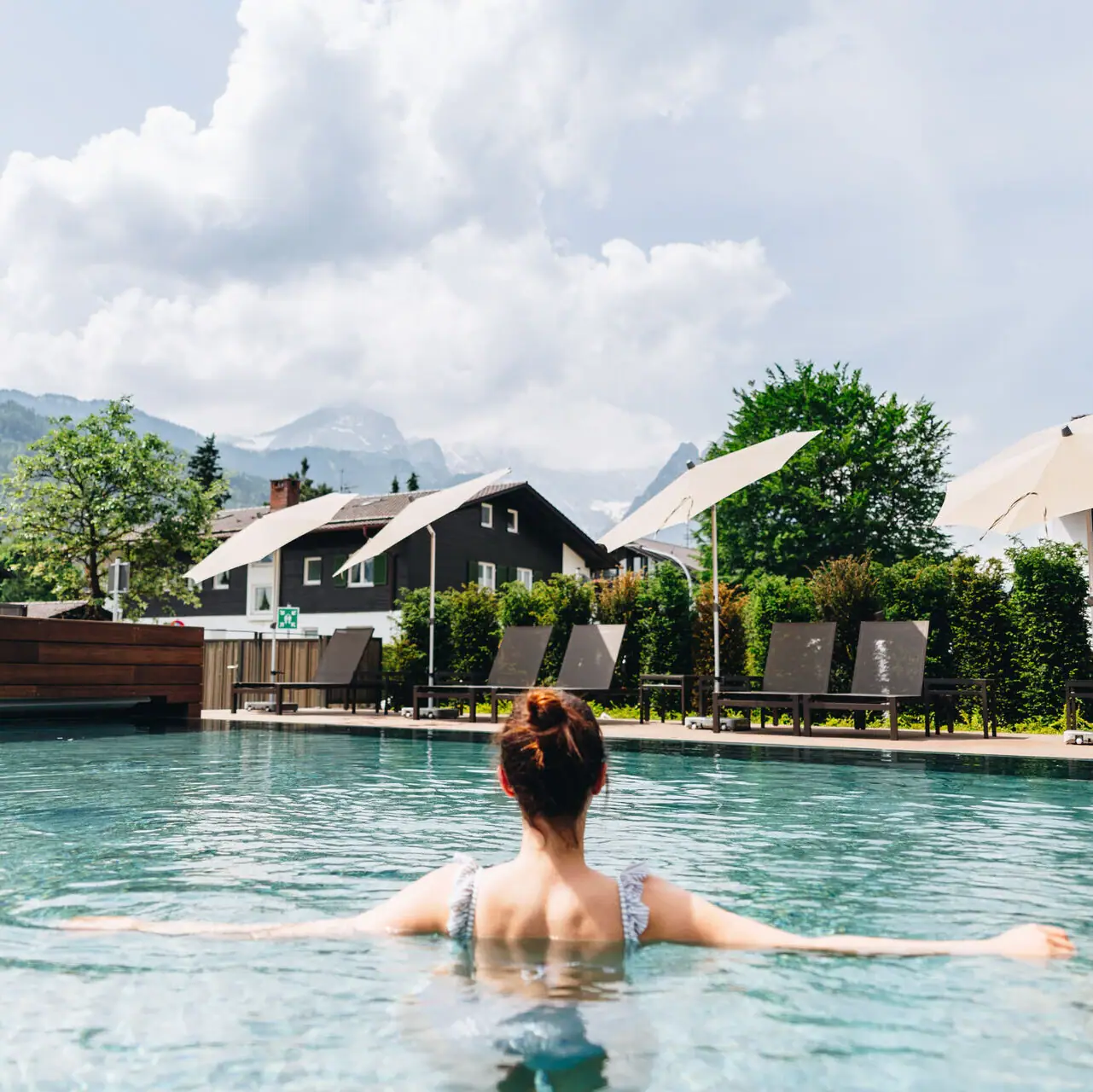 Outdoor pool Woman swimming in a pool