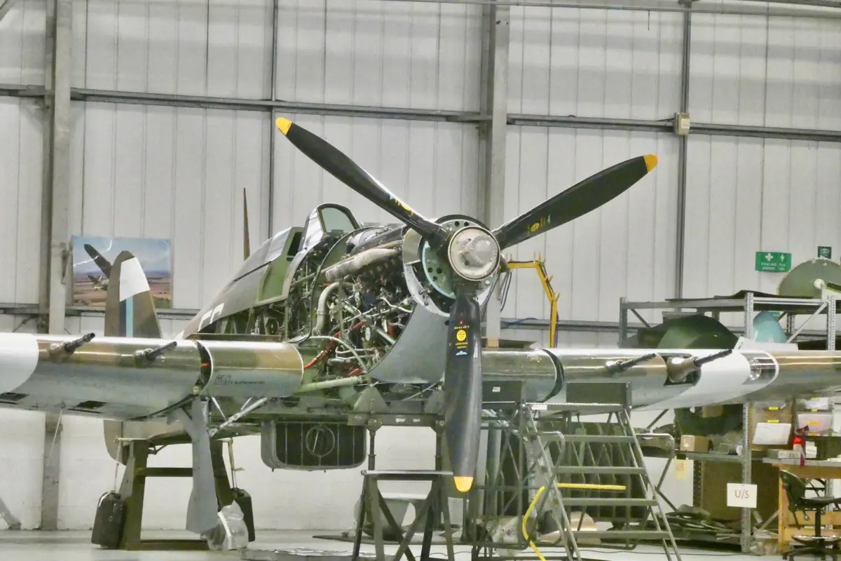 An aeroplane in a hangar.