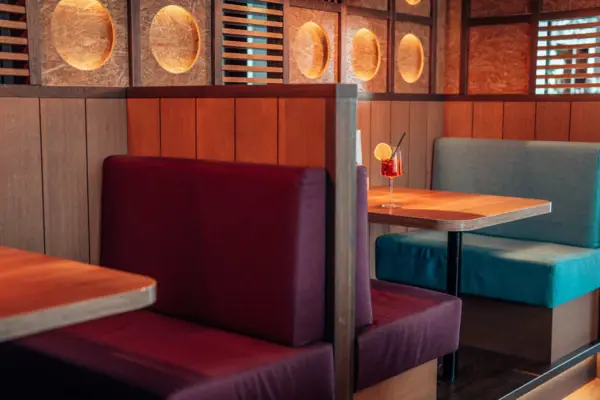 A table and chairs in a restaurant.