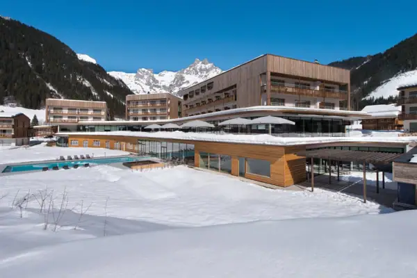 A building with a pool in the snow.
