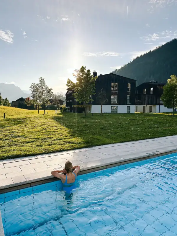 A woman swims in a pool.