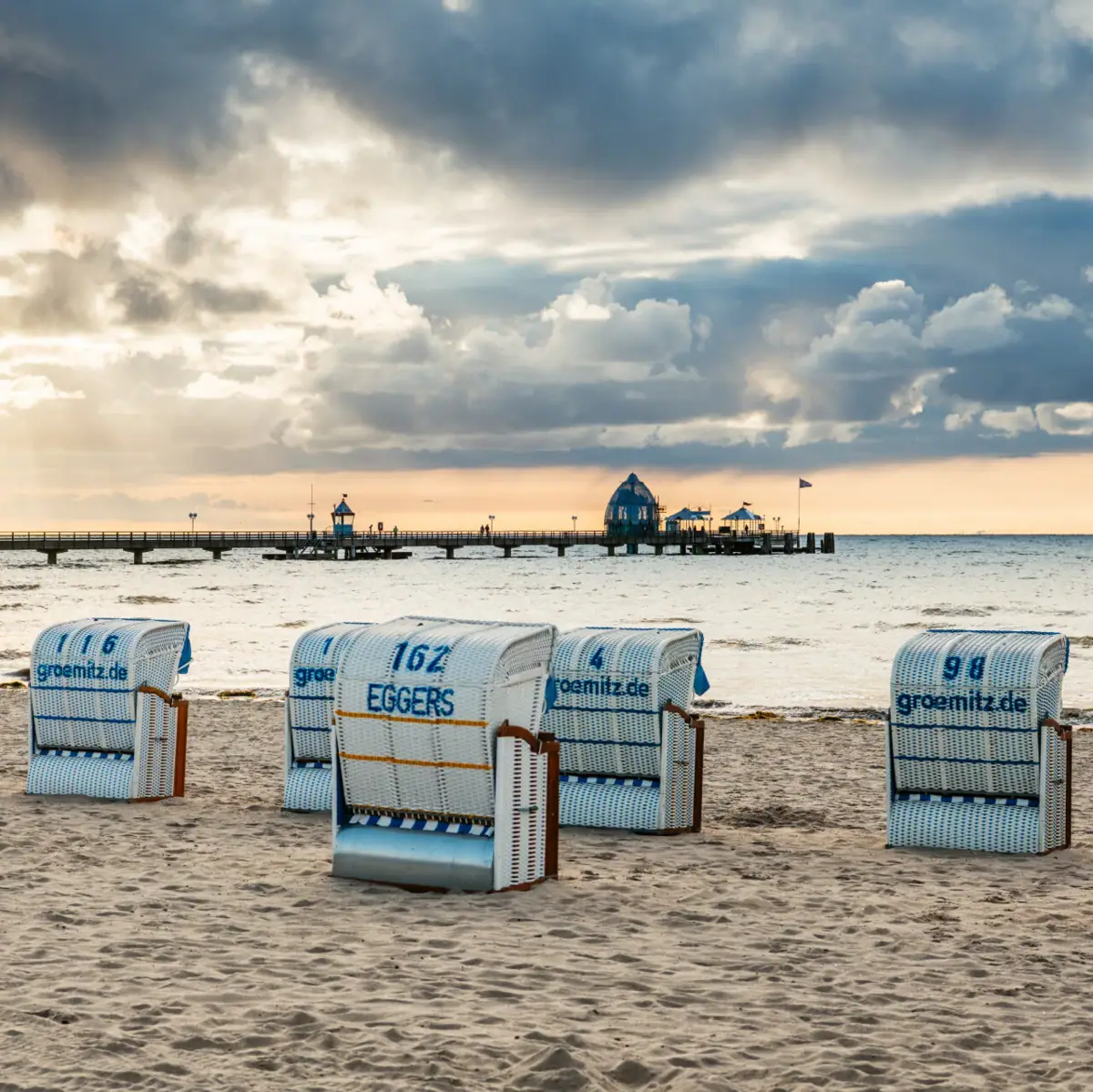 Grömtiz beach A group of beach chairs on the beach.