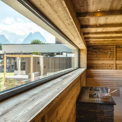 Sauna Window with wooden wall and wooden sauna.