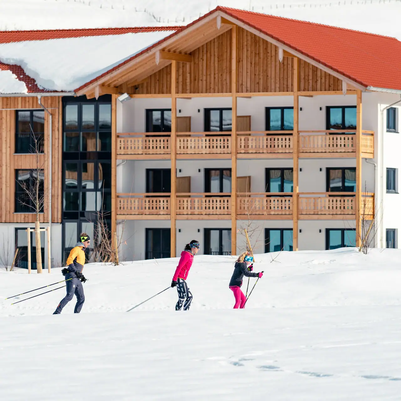 aja Ruhpolding in the snow A group of people skiing in the snow.