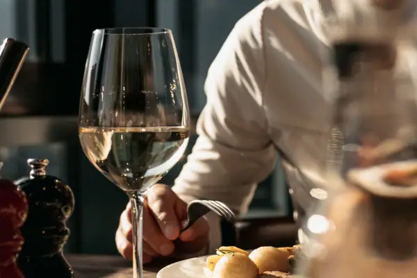 One person is eating at a table.