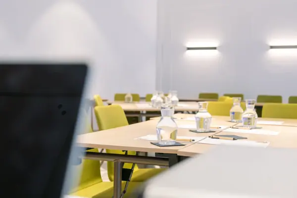 A table with water bottles on it.