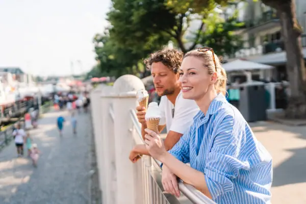 A man and a woman eating ice cream.