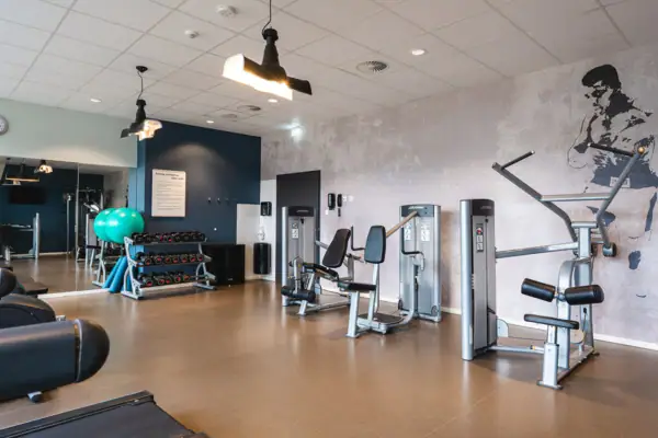 A fitness studio with training equipment.
