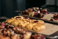 Fresh pastries A tray of pastries on a table