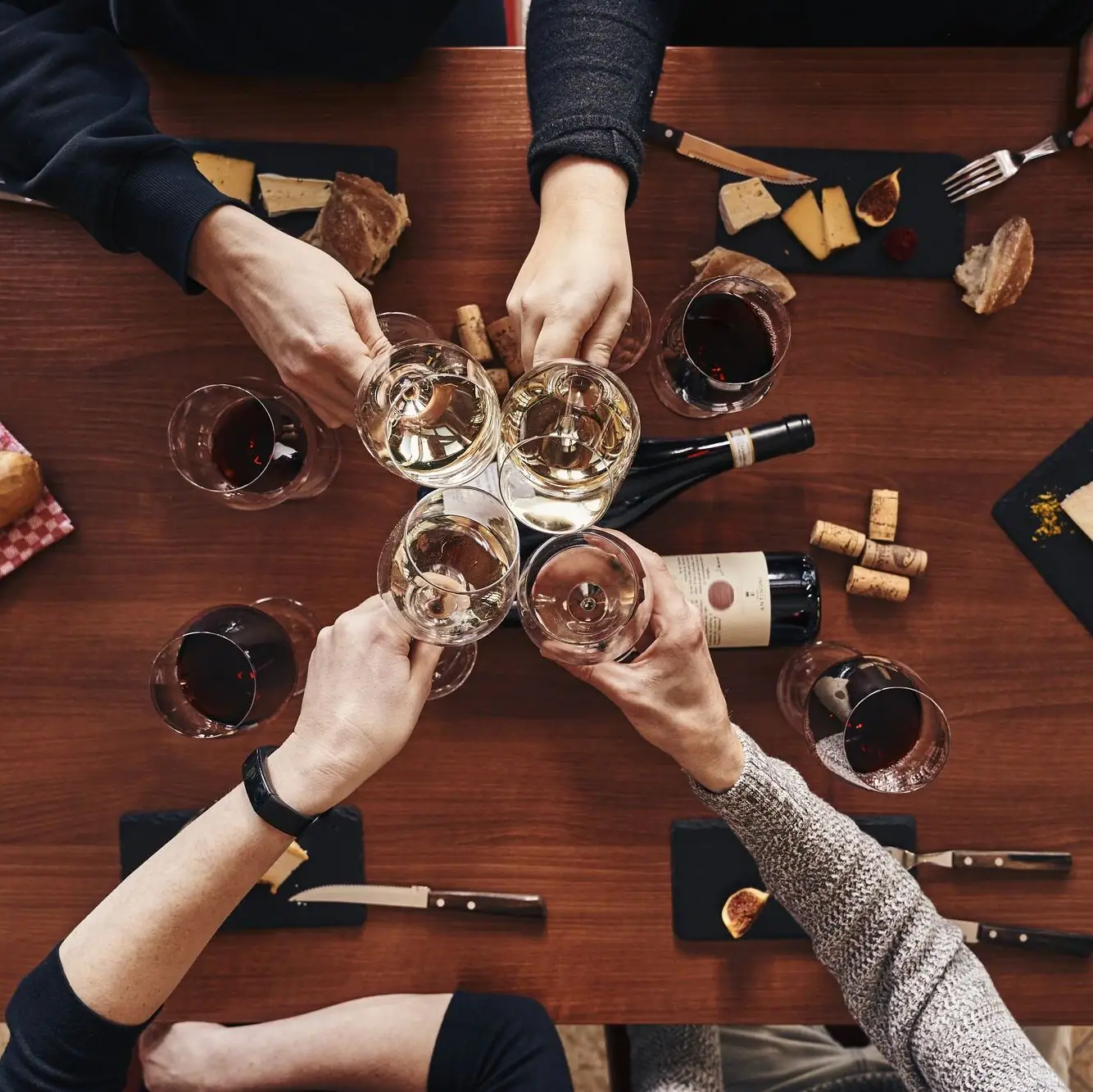Toast A group of people holding wine glasses.