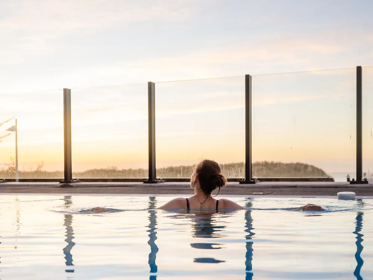 A woman in a swimming pool.